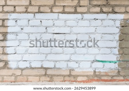 Painted rectangle patch on the wall. Painted rectangular censored graffiti on the wall, blank banner. Backgrounds and texture with empty surface for image or text, copy space.