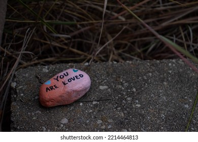 A Painted Rock That Says, 'You Are Loved.'