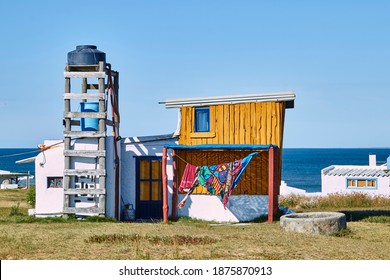 Painted Shack With Water Tank In The Dropout Village Cabo Polonio In Uruguay, South America