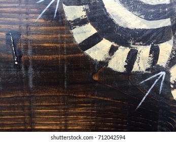 Painted Tribal Pattern On Wood Texture For Interesting Backgrounds.