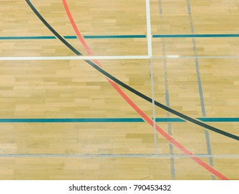 Painted Wooden Floor Of Sports Hall With Colorful Marking Lines. Schooll Gym Hall. 