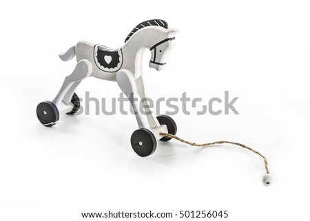 painted wooden toy horse selected focus isolated