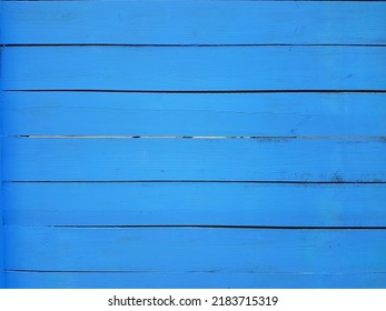 Painted wooden wall, fence blue color - Shutterstock ID 2183715319