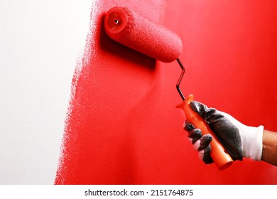 Painter Is Painting The Interior Wall Red