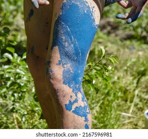 The painter stained his bare legs with paint. Safety precautions
