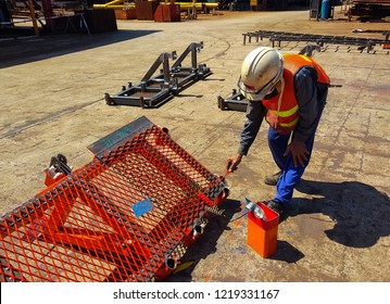 Painter Is Used Paint Roller For Painting Steel Structures At Industrial Factory.