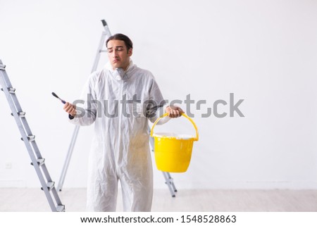 Painter working at construction site