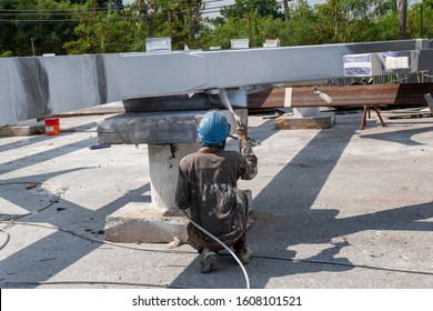 The Painter Is Working To Fireproof Paint On Steel Structure With Spray Gun, At Industrial Factory.