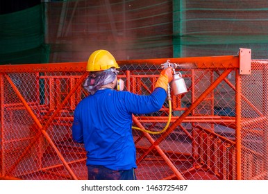 The Painter Is Working To Painting The Steel Structure With Spray Gun.