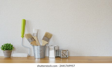 Painter's tools.Brushes and rollers on the table.