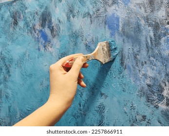 Painting an abstract picture, background, texture, brush - Shutterstock ID 2257866911