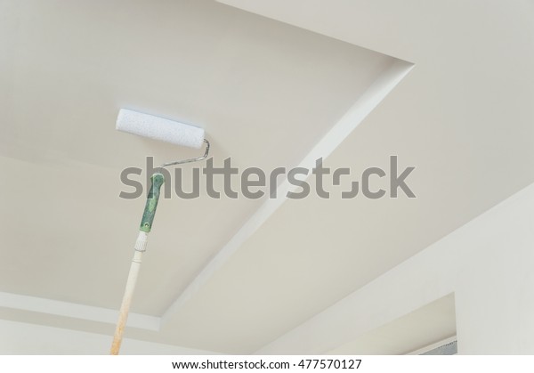Painting Ceiling Walls Roller Touching Surface Stock Photo
