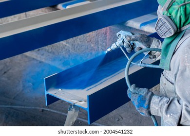 Painting Color Top Coat On Steel Structure With Spray Gun At Industrial Factory.