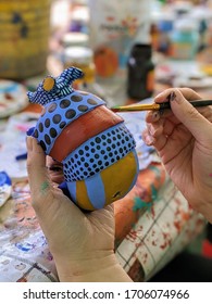 Painting Colorful Armadillo Alebrije In Oaxaca, Mexico