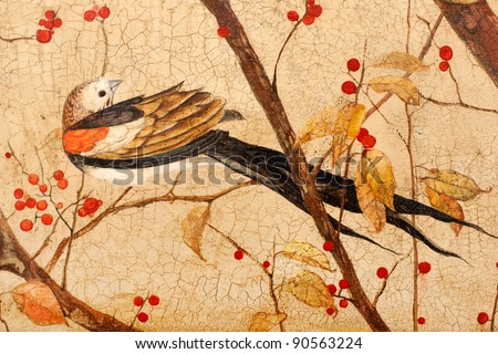 Painting. Colorful bird on branches with red berries