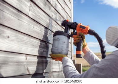 Painting Fence Or Garden Shed With A Paint Sprayer, Home Diy Maintenance