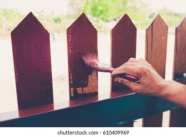 Painting The Fence House