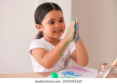 Painting hands, mess and happy child with art, home and learning creative expression at kindergarten. Education, color or Mexican kid with craft, splash or artistic shape, handprint or canvas fun - Powered by Shutterstock