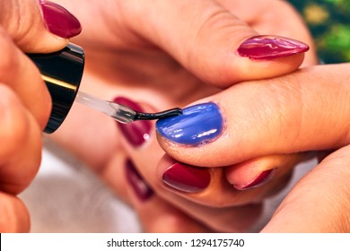 Painting Nails With Colored, Hybrid Varnish
