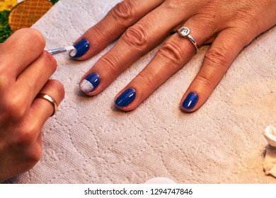 Painting Nails With Colored, Hybrid Varnish
