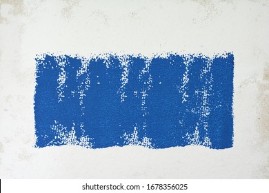 Painting A Rough Wall With Roller. Paint Roller Leaving Stroke Of White Color Over A Rustic Background. Usable For Text And Messages.