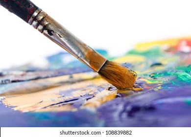 Painting some picture with paintbrush, isolated on white background