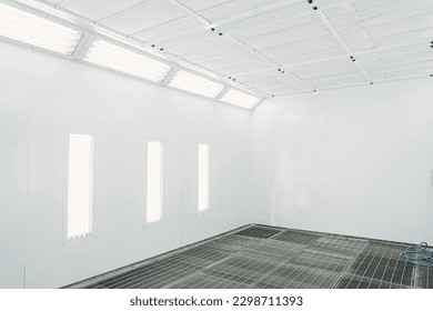 Painting of vehicles in a room with a filter and good light. Spray paint cabinet in a car repair station. Auto service concept. - Powered by Shutterstock