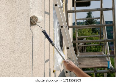 Painting Walls.Repair And Construction .Details Of Painting Walls, Roller,staircase, Scaffolding And Other Tools For Painting Walls Of The House Outside.home Renovation Outside