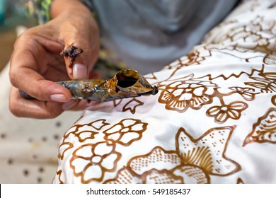 Painting Watercolor On The Fabric To Make Batik. Batik-making Is Part Of Indonesian Culture