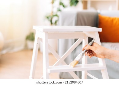 Painting Wooden Chair White Colour With Brush.