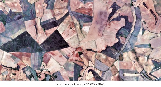paintings of war, tribute to Picasso, abstract photography of the Spain fields from the air, aerial view, representation of human labor camps, abstract, cubism, abstract naturalism,