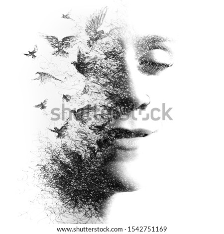 Paintography. Double Exposure portrait of a young female disappearing into particles which transform into flying birds, hand drawn, black and white