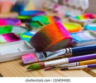 Paints , sponges and brushes for face painting. Close up - Powered by Shutterstock