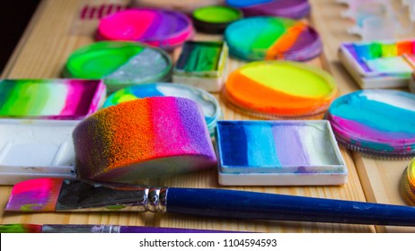 Paints , sponges and brushes for face painting. Close up, top view - Powered by Shutterstock