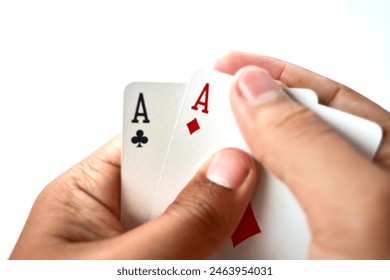 pair aces . hand holding card poker . playing cards isolated white background - Powered by Shutterstock