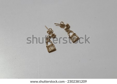 Pair Of Antique Gold Plated Stone Drop Earrings Isolated on White Background