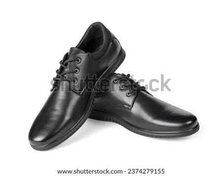 A pair of black men's elegant leather shoes isolated on a white background. Men's shoes.