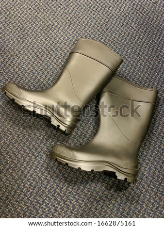 A pair of black rubber boots. Stock photo © 