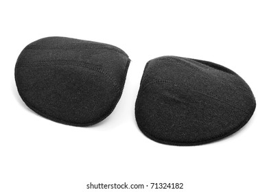 A Pair Of Black Shoulder Pads On A White Background