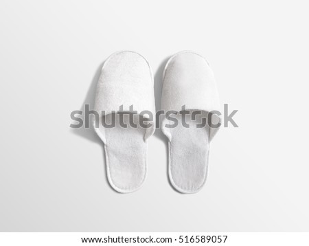 Pair of blank soft white home slippers, design mockup. House plain flops mock up template top view. Clear warm domestic sandal. Bed shoes accessory footwear.