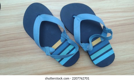 A Pair Of Blue Children's Sandals