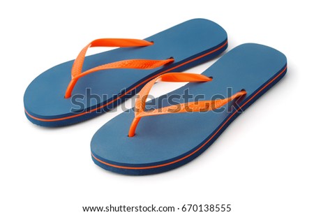 Pair of blue flip flops isolated on white