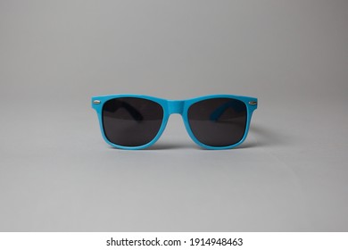 Pair Of Blue Plastic Sunglasses