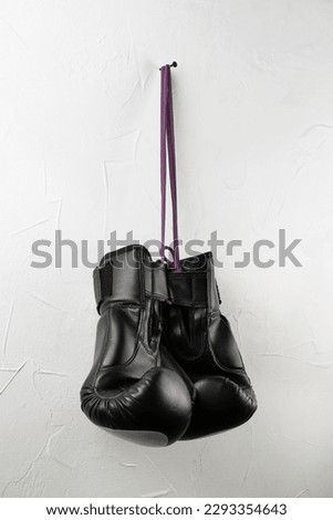 pair of boxing gloves. leather Boxing gloves. boxing accessories background. boxing equipment. black.