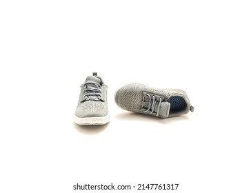 A Pair Of Brand New Grey Shoe For Toddler Boys Isolated On White Background. Sneakers For Toddler With Clipping Path And Copy Space.