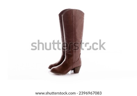 A pair brown boots shoes on a white background