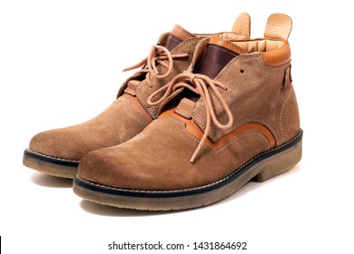 Pair of brown hiking boots isolated on a white background. - Shutterstock ID 1431864692