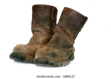 Pair Of Brown Leather Well Worn  Steel Toe Capped Builders Boots, Covered In Mud And Paint Splatters.