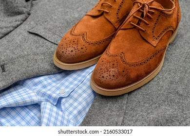 A Pair Of Brown Suede Derby Shoes With Grey Tweed Blazer. Casual Business Outlook. 