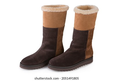 A Pair Of Brown Suede Women's Boots With A Fur Trim, On A White Background, Isolate